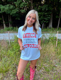 America Needs Cowgirls Tee