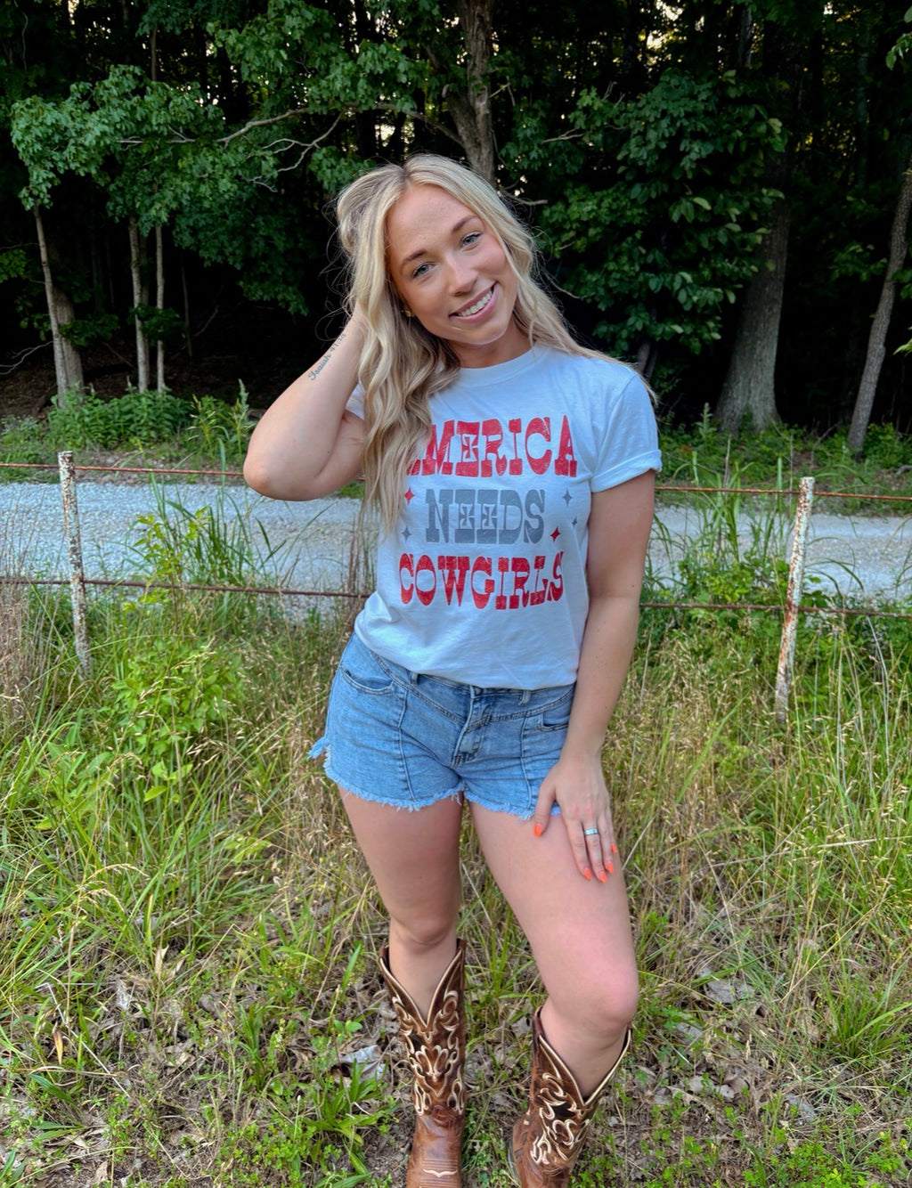 America Needs Cowgirls Tee