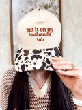 "PUT IT ON MY HUSBANDS TAB" Hat