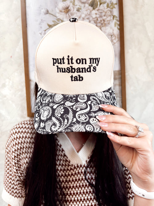 "PUT IT ON MY HUSBANDS TAB" Hat